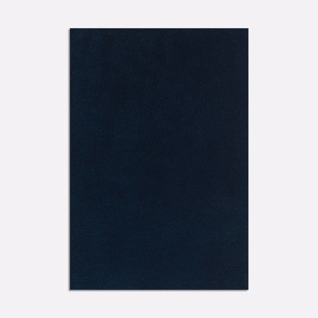 Near-black indigo velvet swatch with a softly shifting, light-catching nap