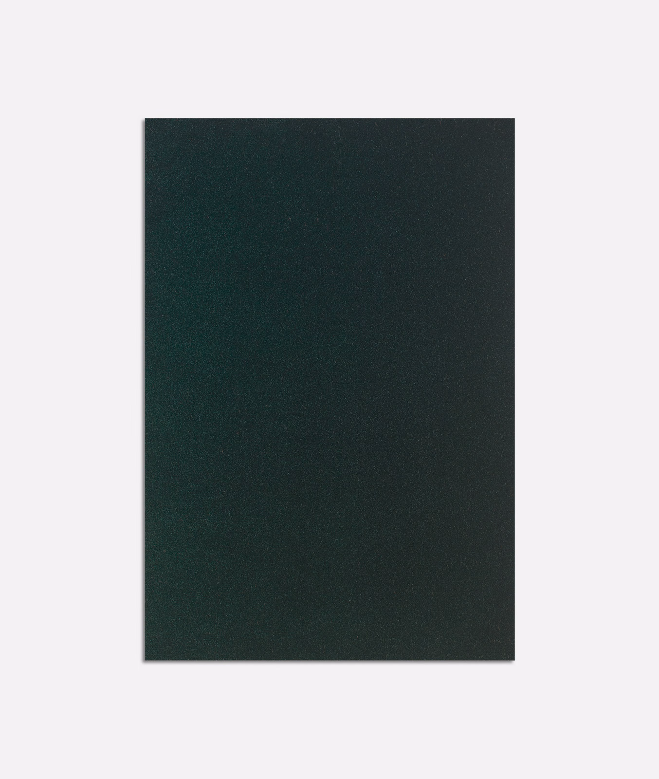 Deep forest-green velvet with subtle nap variation across a plain surface