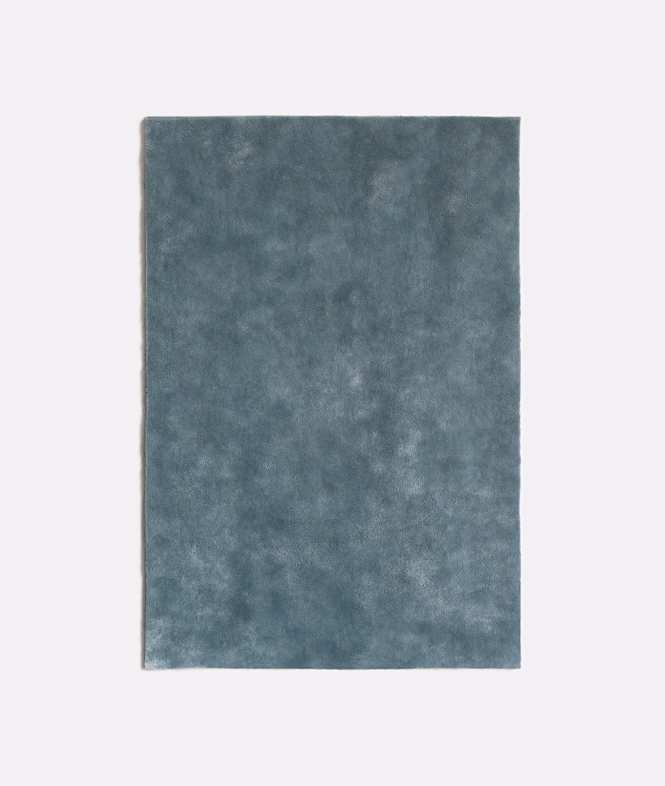 Cool acier blue-grey velvet with softly clouded, light-catching nap