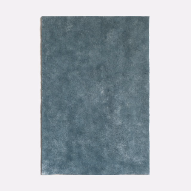 Cool acier blue-grey velvet with softly clouded, light-catching nap