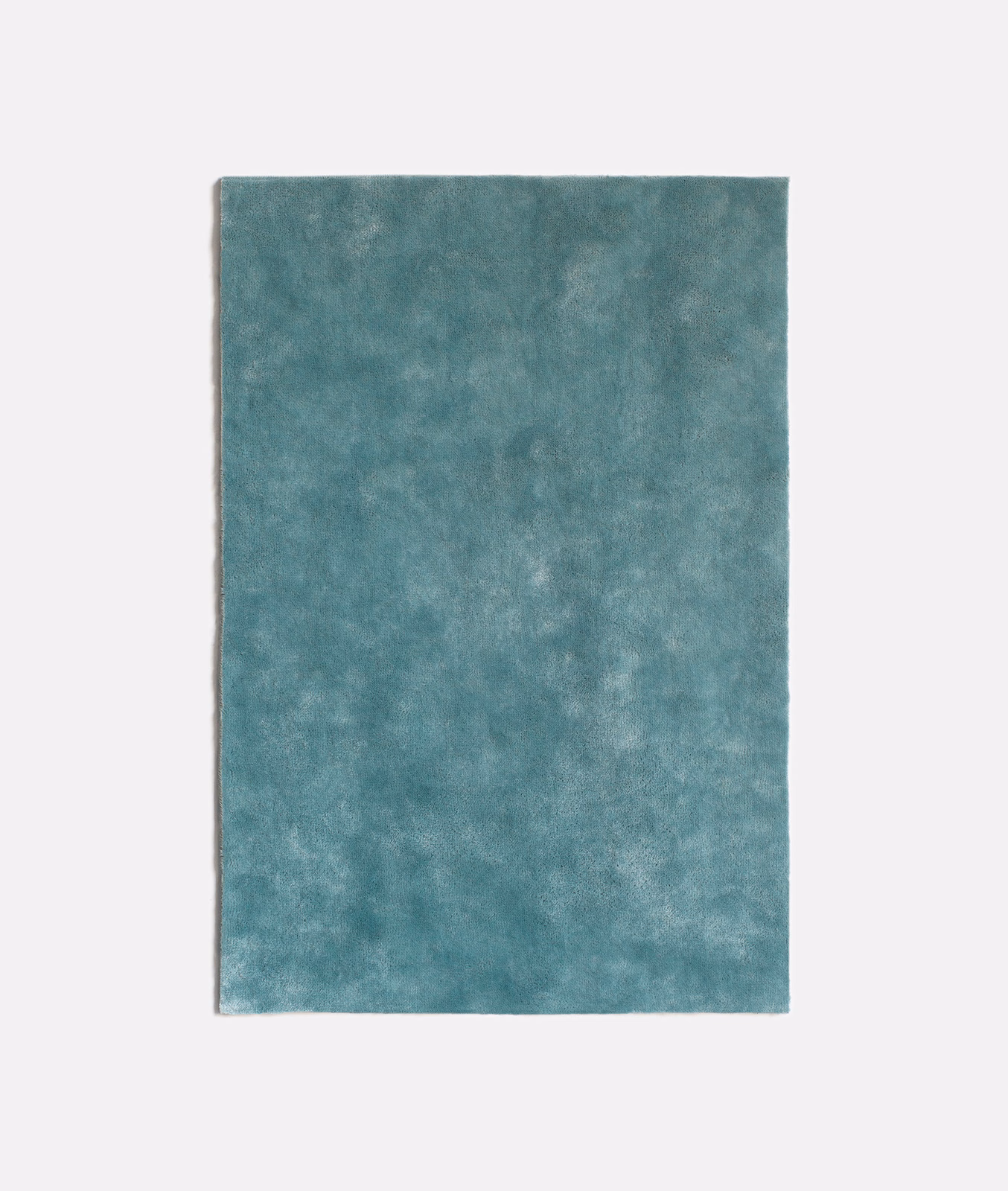 Muted aqua-teal velvet swatch with cloudy, light-catching pile
