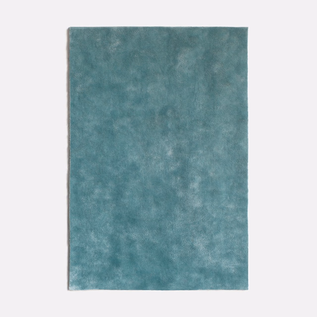 Muted aqua-teal velvet swatch with cloudy, light-catching pile