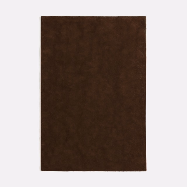 Deep ebony-brown velvet swatch with subtly mottled, light-catching nap