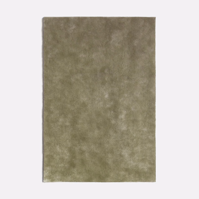 Mottled lichen olive velvet swatch showing soft, shifting highlights across the plush pile