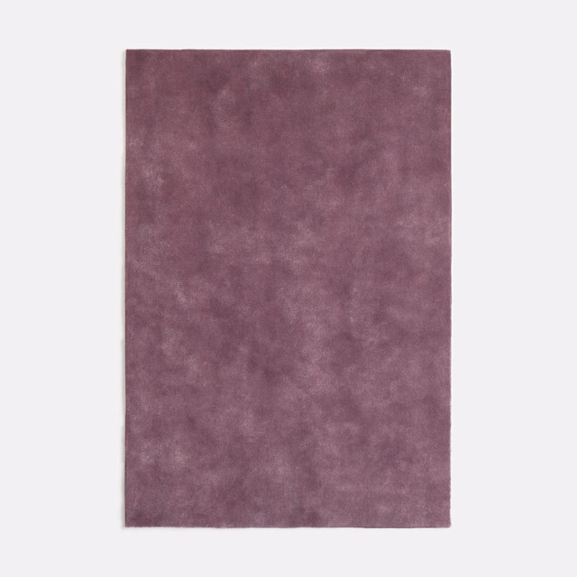 Mottled lilac-mauve velvet swatch with a soft, light-catching nap