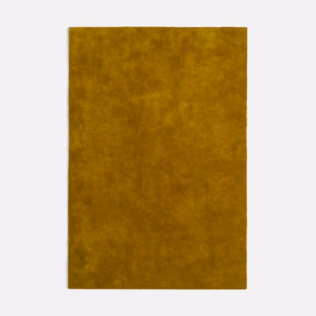 Warm mustard-gold velvet swatch with softly mottled, light-catching pile