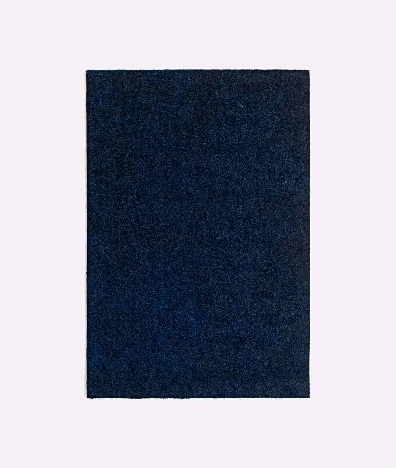 Deep navy velvet swatch with a softly mottled, light-catching plush pile