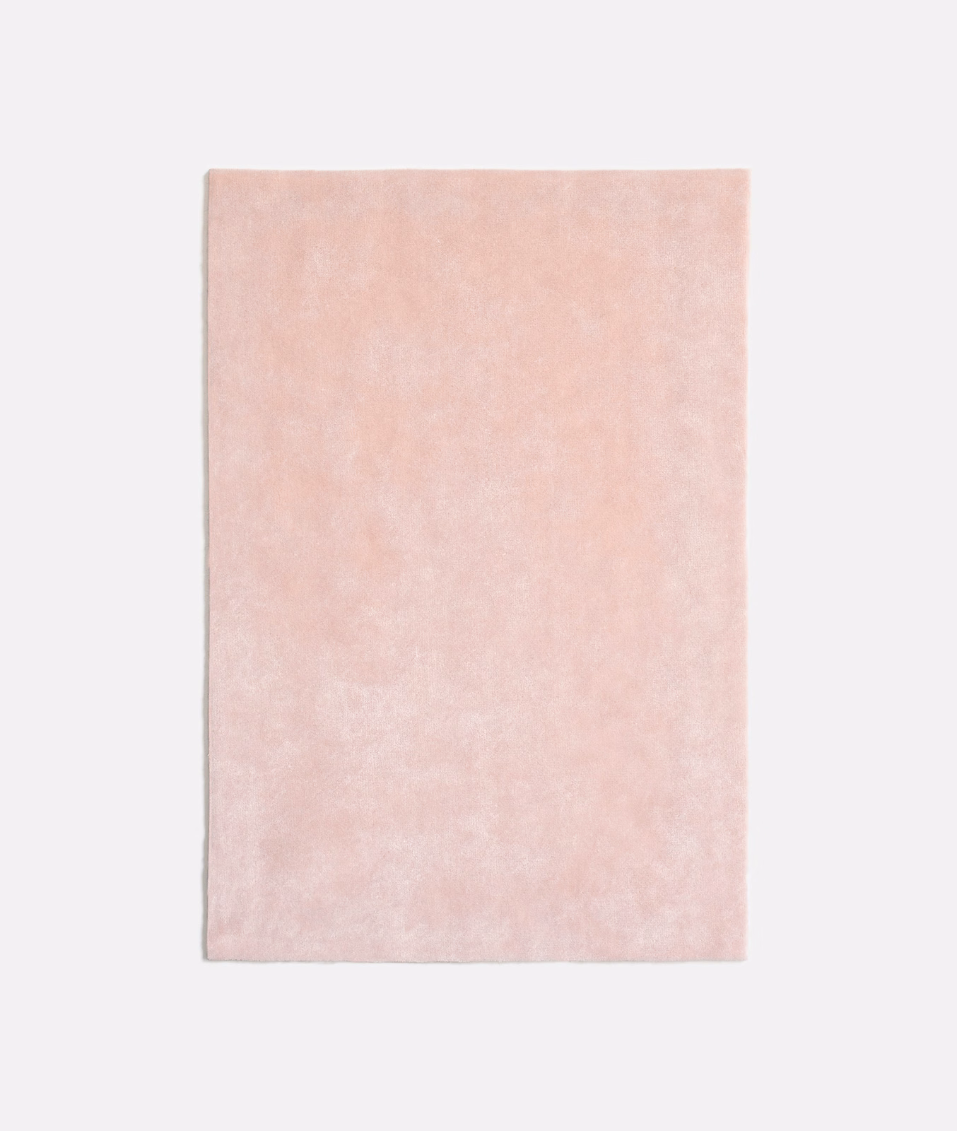 Pale blush pink velvet with a softly mottled, light-catching nap