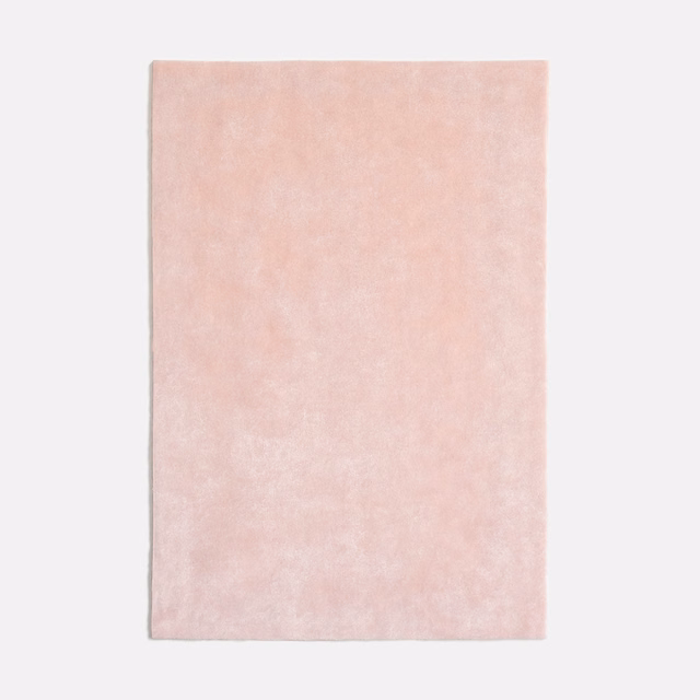 Pale blush pink velvet with a softly mottled, light-catching nap
