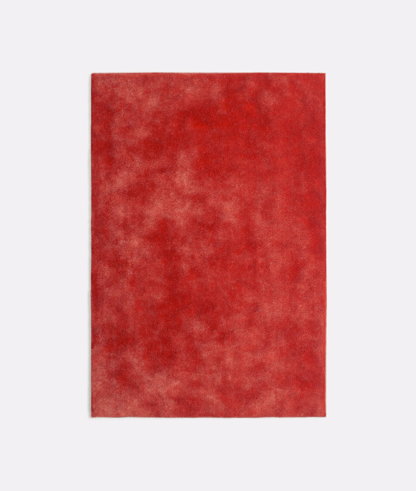 Deep crimson red velvet with cloudy tonal variation and softly shifting nap