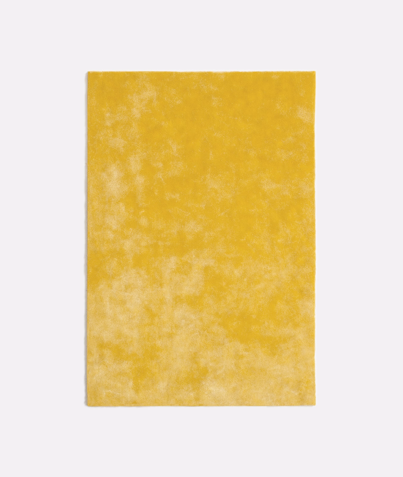 Warm mustard-yellow velvet swatch with a softly mottled, clouded nap