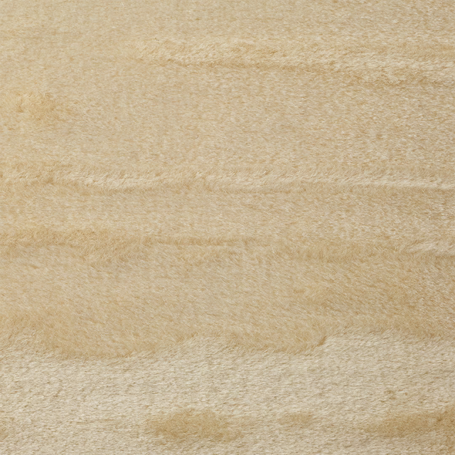 Warm oat-beige velvet with brushed pile and subtle horizontal nap shifts