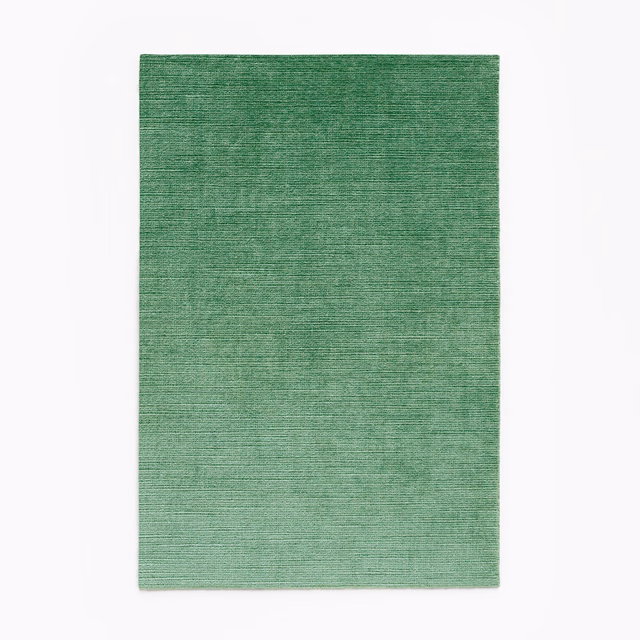 Muted agave green velvet showing fine horizontal striations and subtle tonal depth