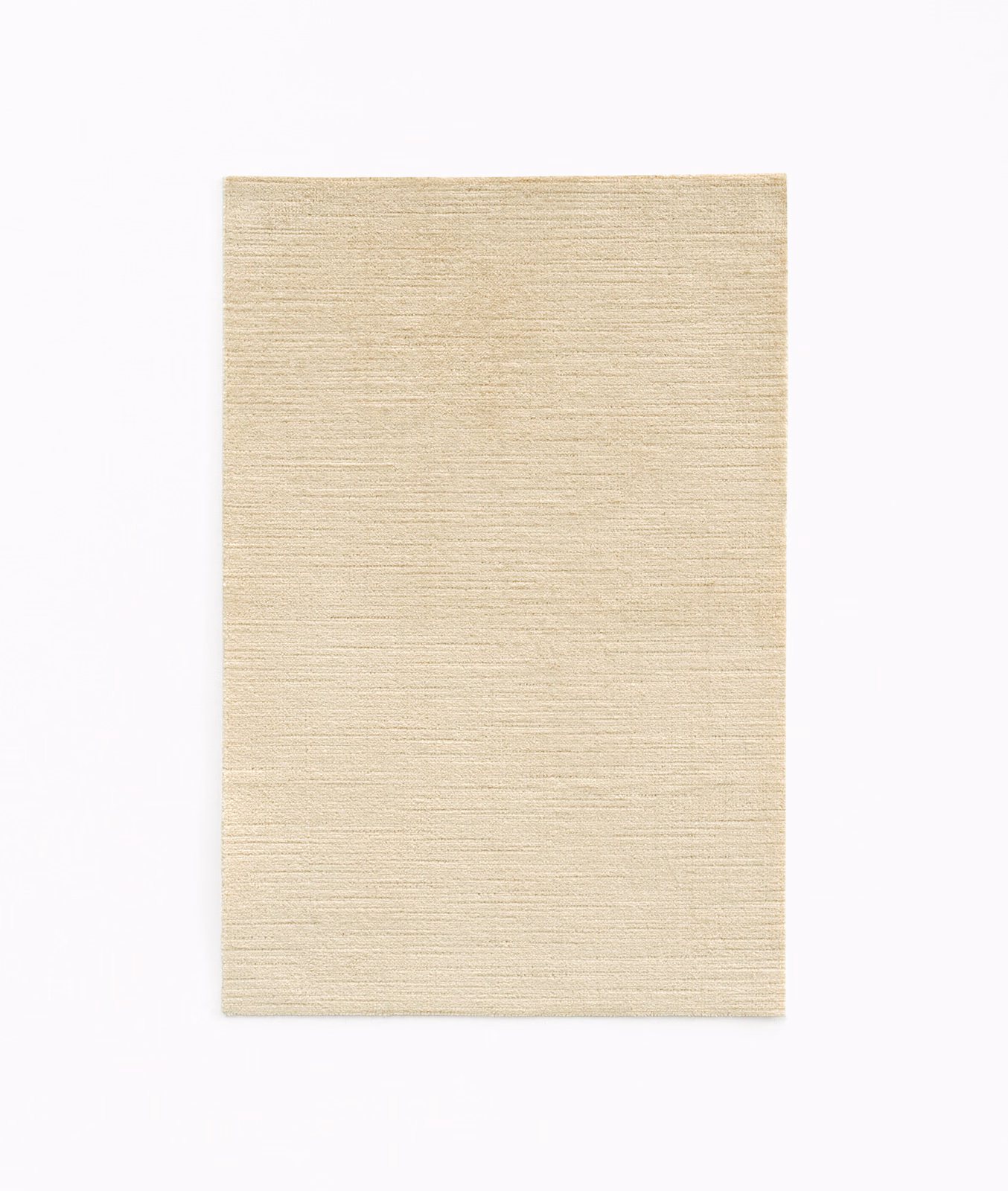 Warm ivory cream velvet swatch with fine horizontal pile lines and subtle sheen