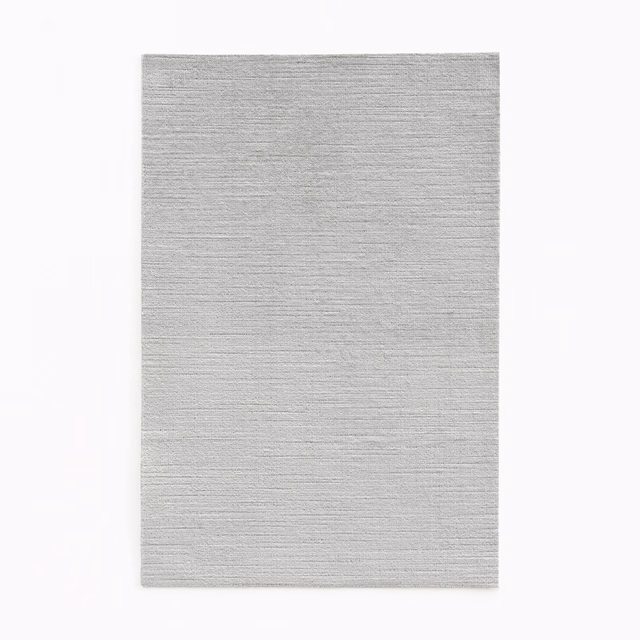 Pale glacier-grey velvet swatch with fine horizontal texture and soft sheen