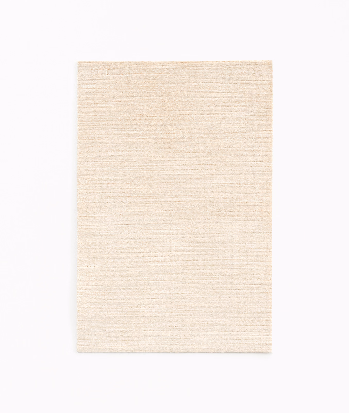 Warm ivory velvet swatch with fine horizontal striations and softly shaded surface