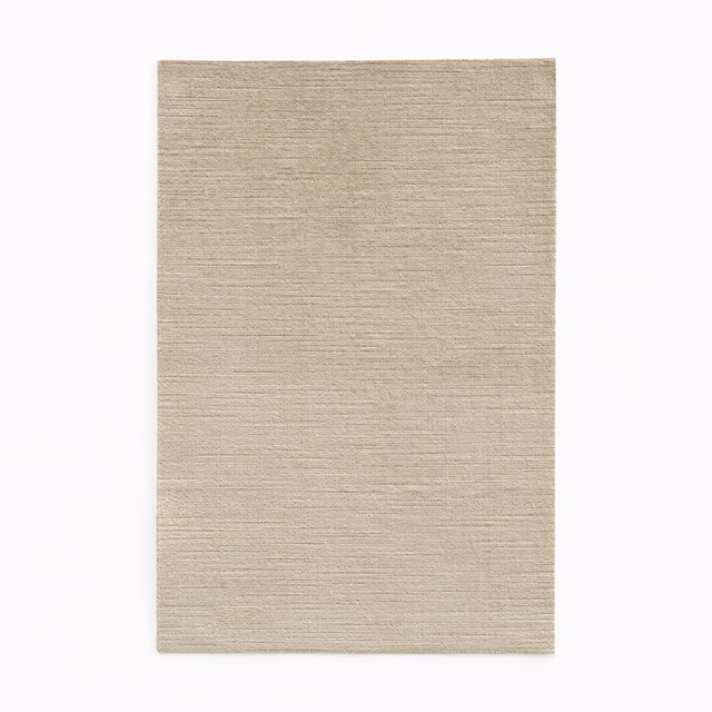 Warm parchment-beige velvet swatch with fine horizontal woven texture