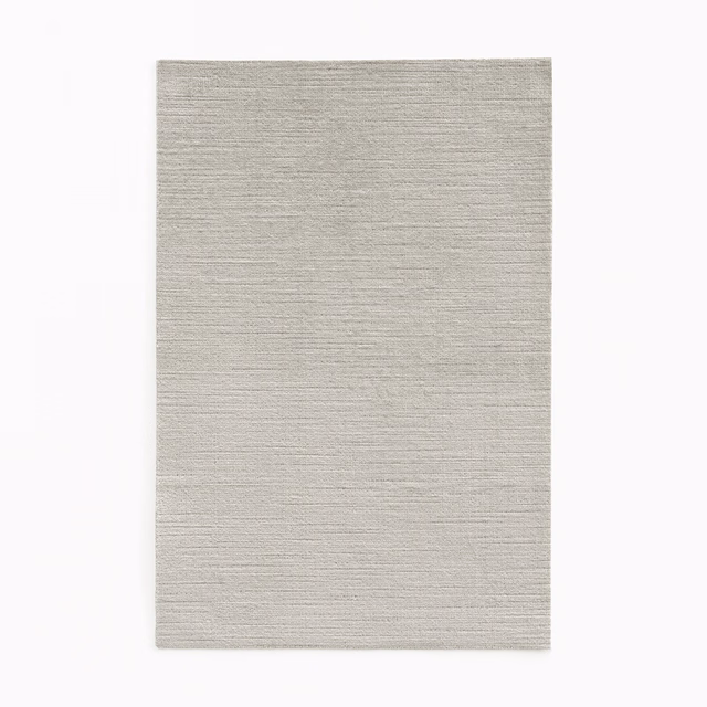 Warm putty-taupe velvet swatch with fine horizontal striated texture