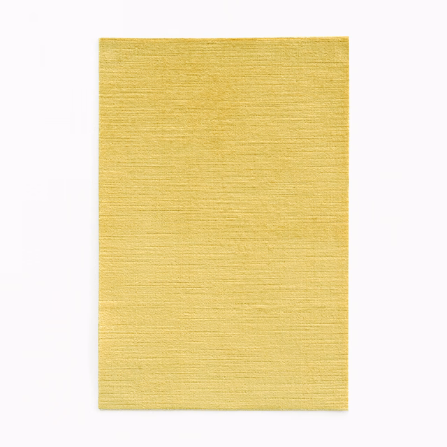 Soft golden-yellow velvet with fine horizontal striations and a gently lustrous surface