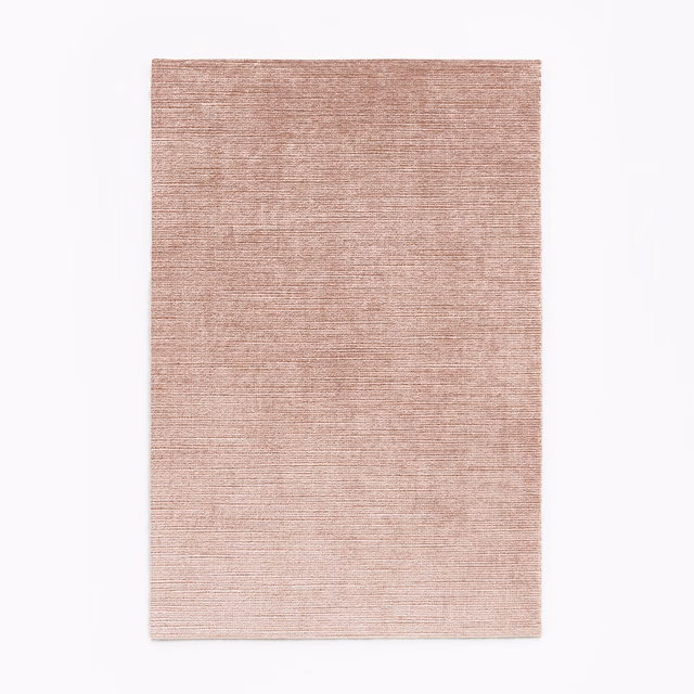 Muted dusty rose velvet swatch with fine horizontal striations and soft tonal depth