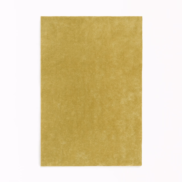 Warm citrine-gold velvet with a softly mottled, light-catching plain pile