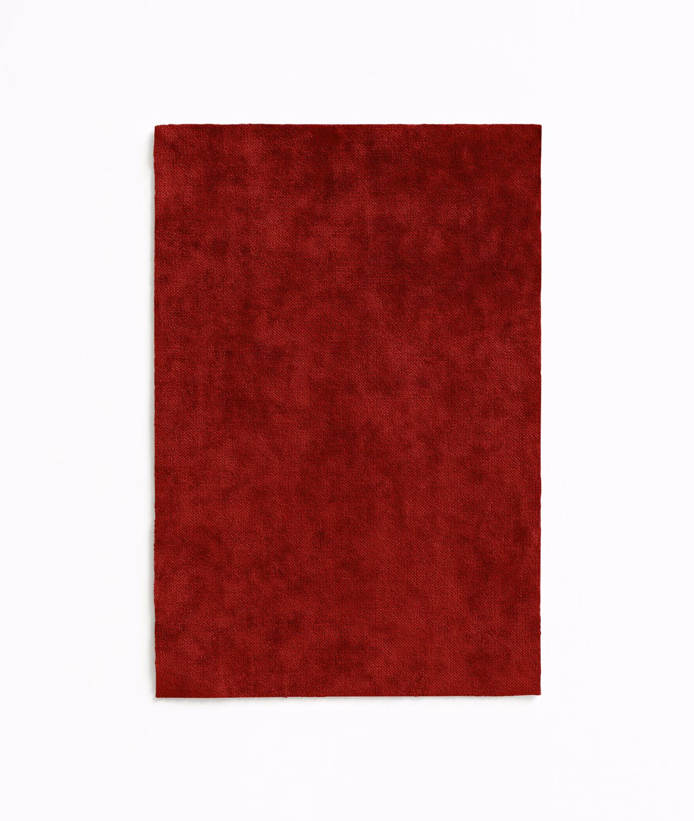 Deep garnet red velvet swatch with softly mottled plush pile