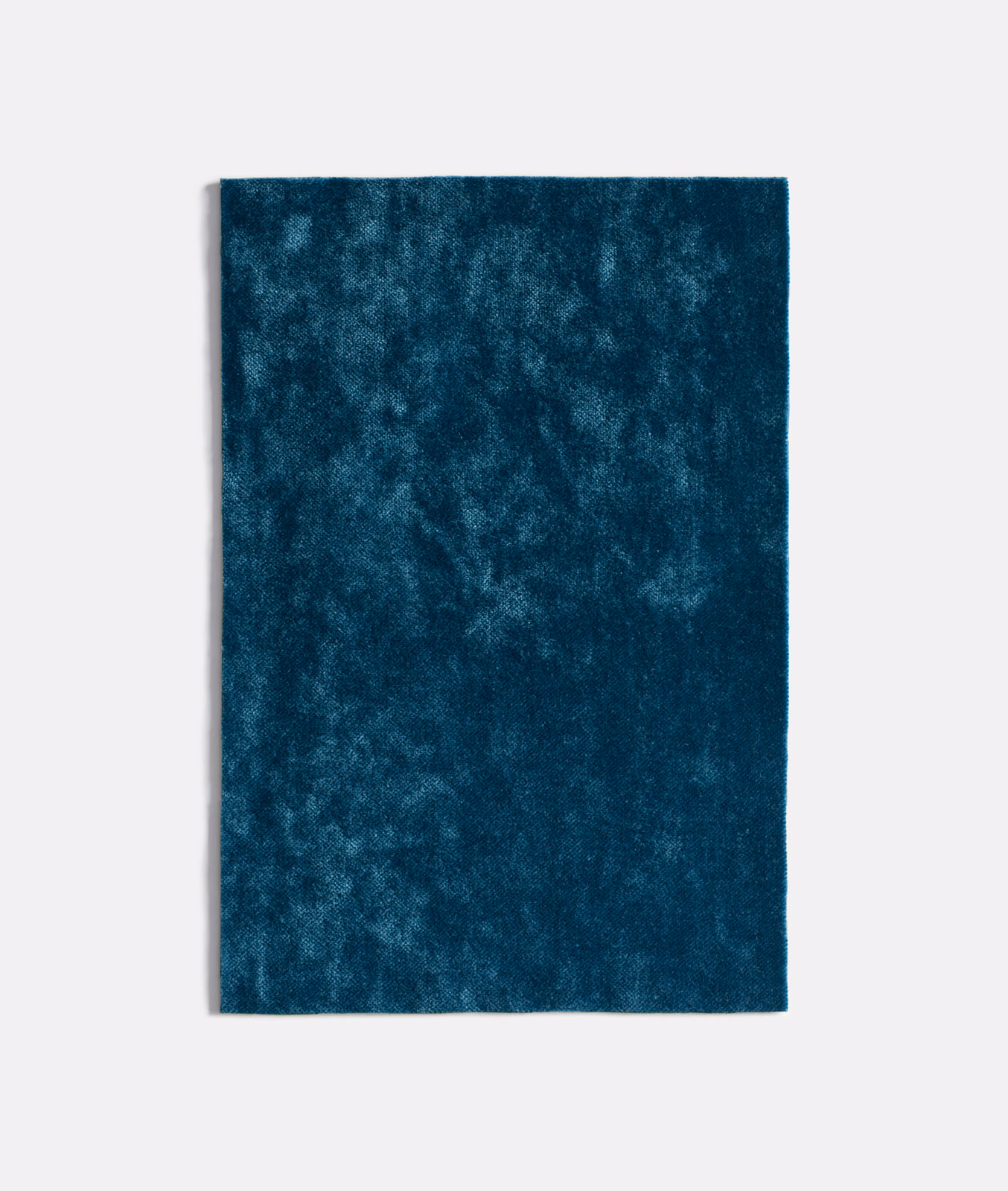Deep indigo velvet swatch with cloudy, light-catching pile variation
