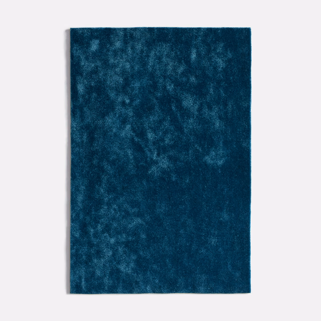 Deep indigo velvet swatch with cloudy, light-catching pile variation