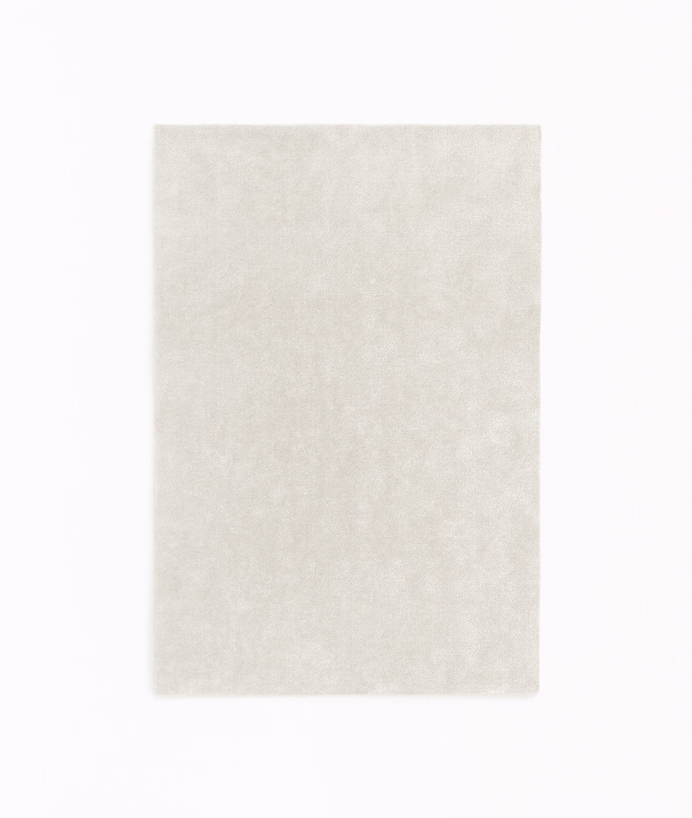 Pale ivory velvet swatch with a softly mottled plush surface
