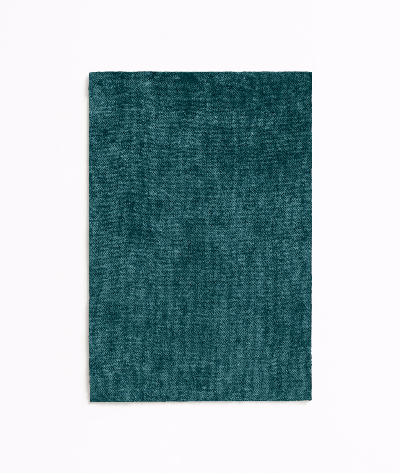 Deep petrol-teal velvet swatch with a cloudy, softly mottled plush pile