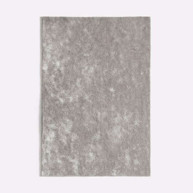 Silver-grey velvet swatch with softly clouded, mottled pile and subtle tonal depth