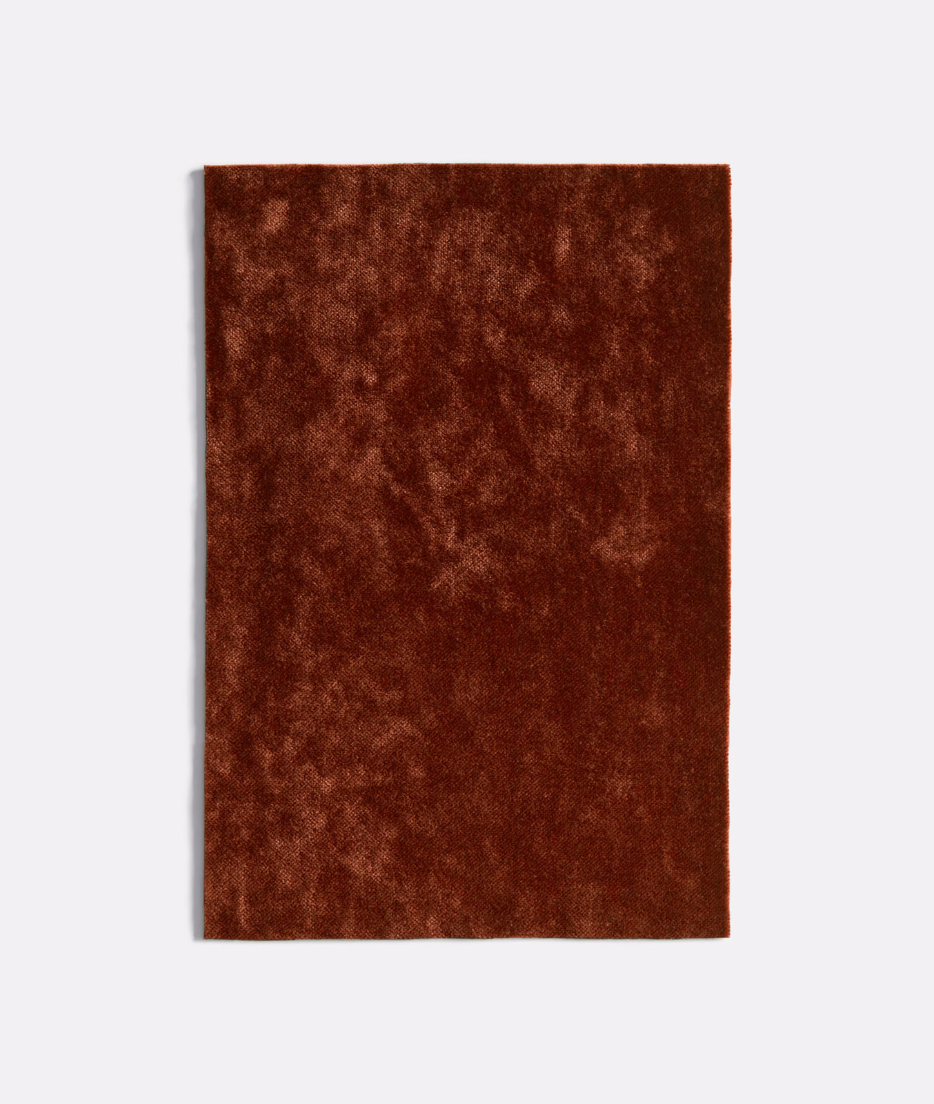 Deep russet-brown velvet swatch with cloudy, light-catching variations across the plush pile