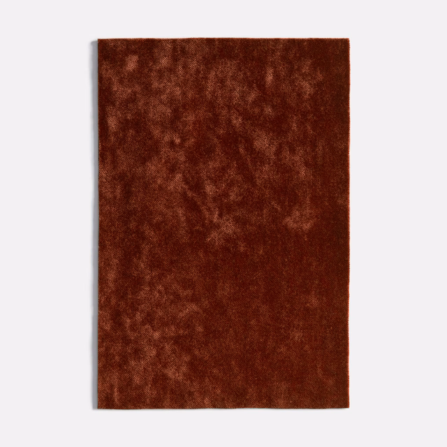 Deep russet-brown velvet swatch with cloudy, light-catching variations across the plush pile