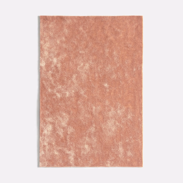 Dusty vieux rose velvet swatch with softly mottled pale highlights and warm depth