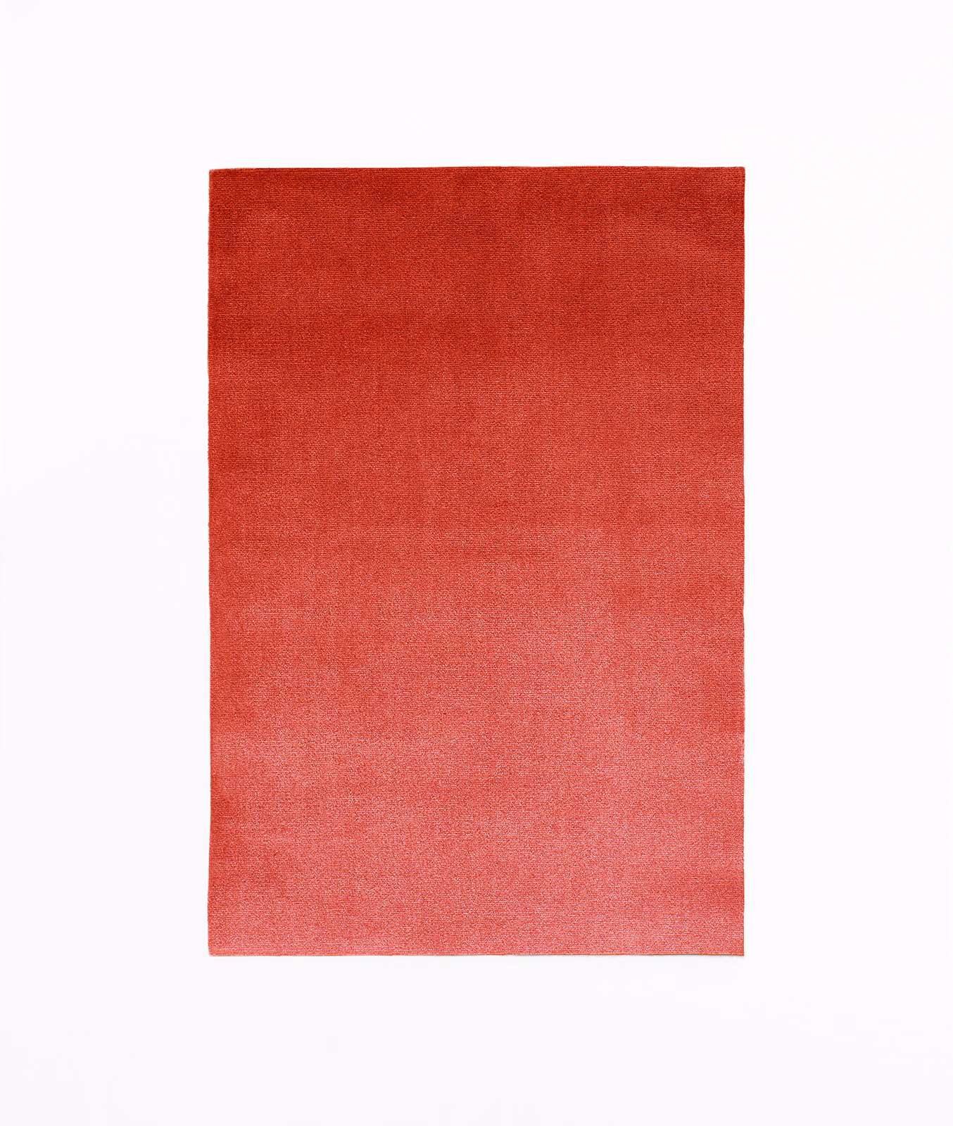 Warm coral-red velvet swatch with darker upper nap and softly brushed sheen