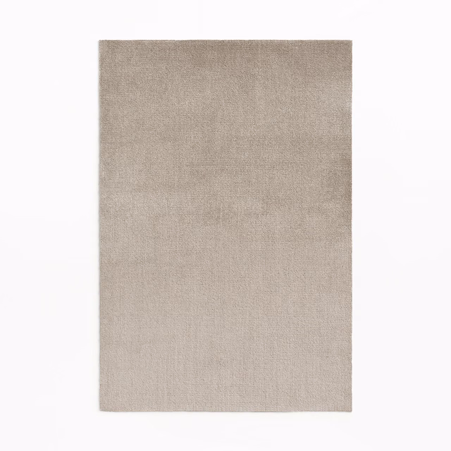 Warm taupe-beige velvet swatch with a quiet, finely shaded nap