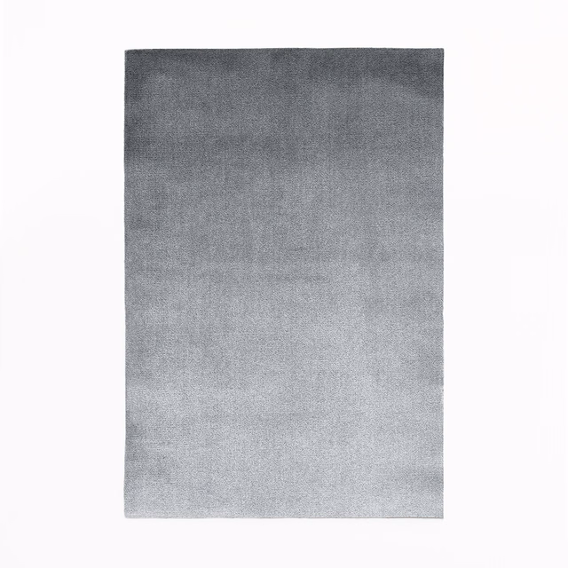 Graduated grey velvet swatch shifting from charcoal top to pale silver bottom