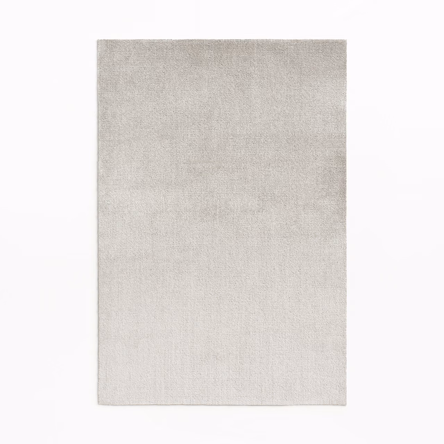 Pale silver-grey velvet swatch with fine softly directional surface texture