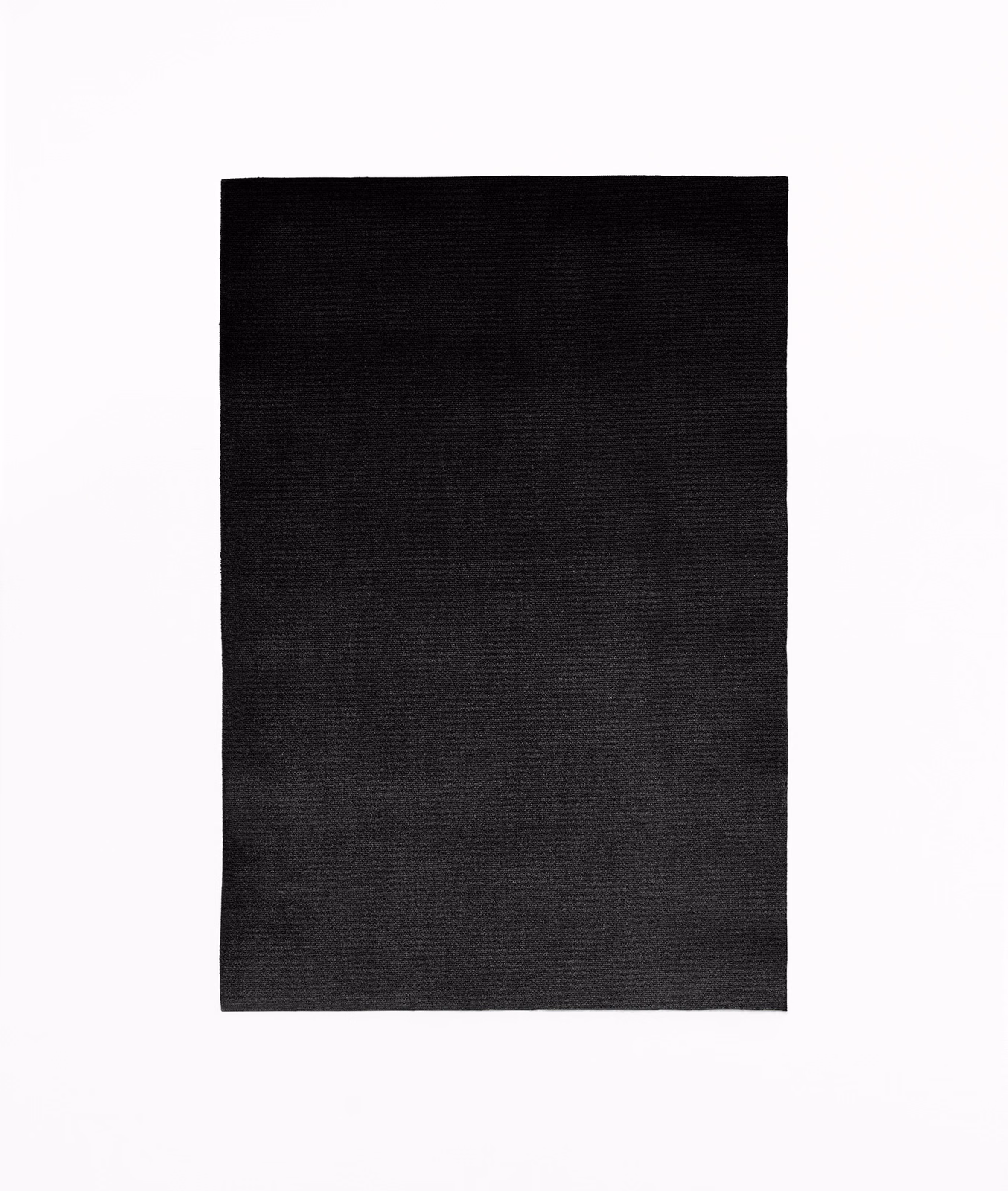 Near-black velvet swatch showing a subtle directional nap and charcoal sheen