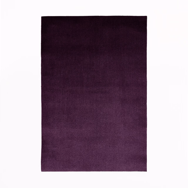 Deep plum velvet swatch showing subtle nap variation and darker upper shading