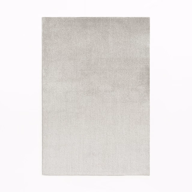 Pale pearl-grey velvet swatch with a fine, softly vertical surface texture