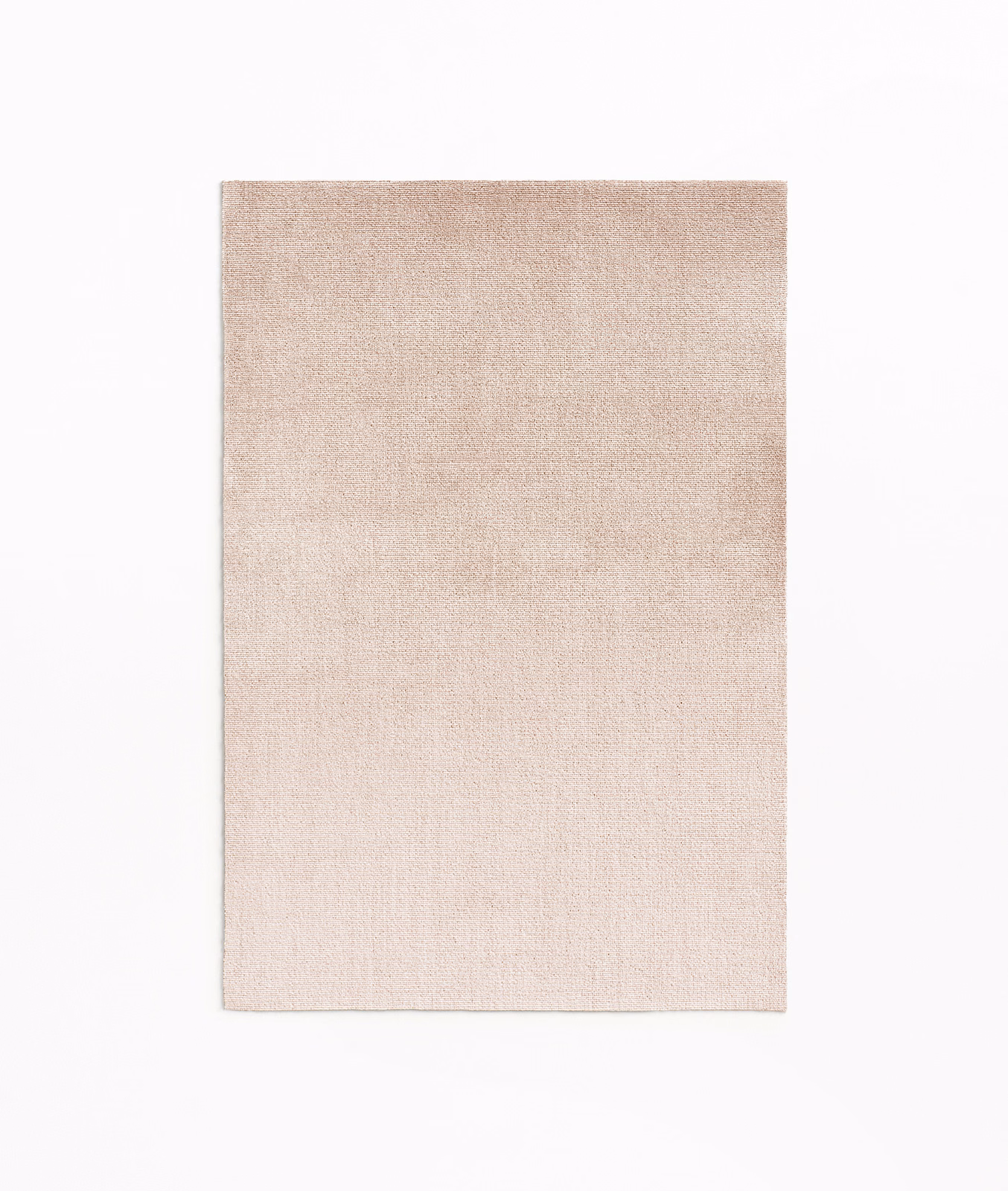 Pale blush-pink velvet swatch with a softly brushed, subtly varied surface