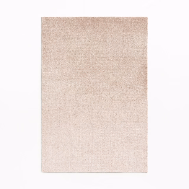 Pale blush-pink velvet swatch with a softly brushed, subtly varied surface