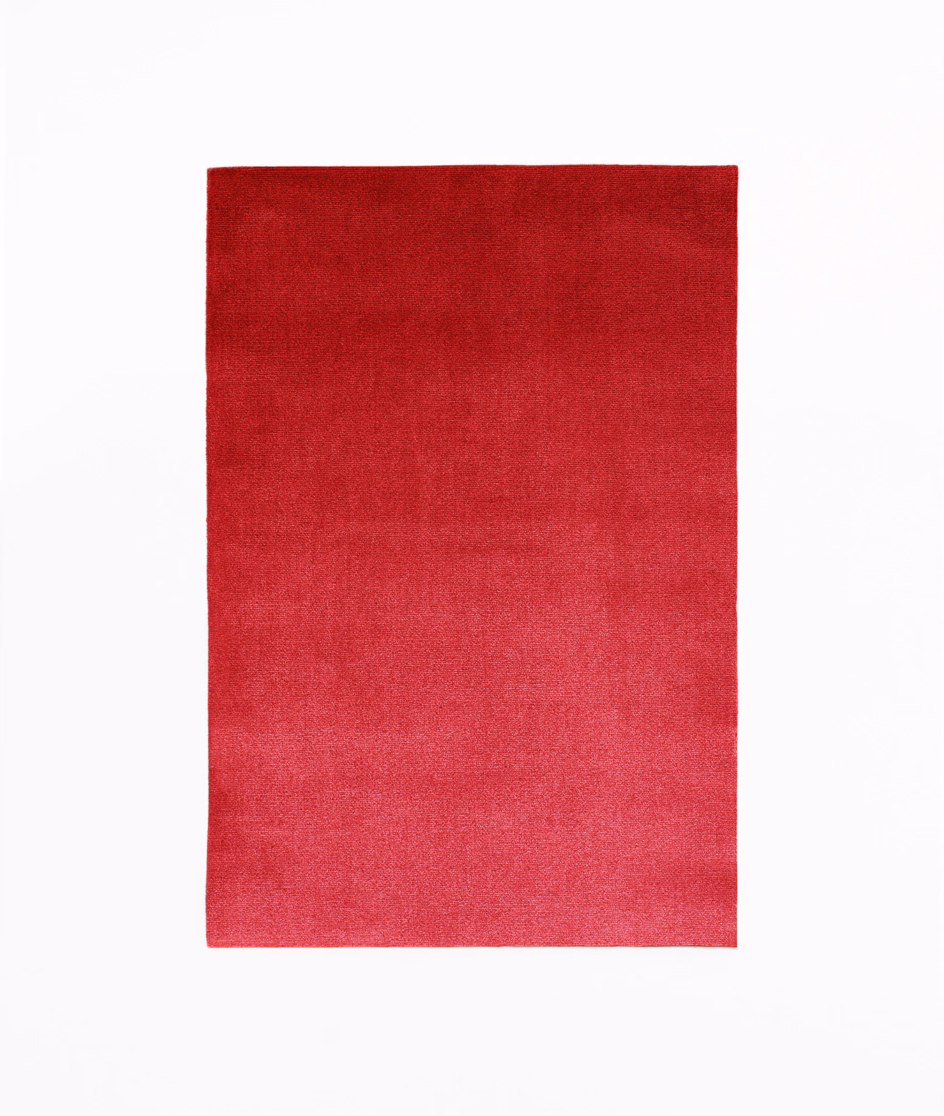 Deep rouge red velvet with a subtly shifting, close-cut pile