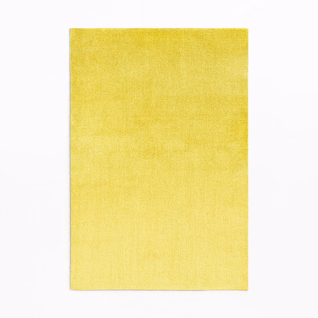 Luminous lemon-yellow velvet swatch with subtle vertical nap and tonal sheen