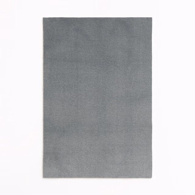 Cool steel-grey velvet with a fine nap and restrained directional sheen