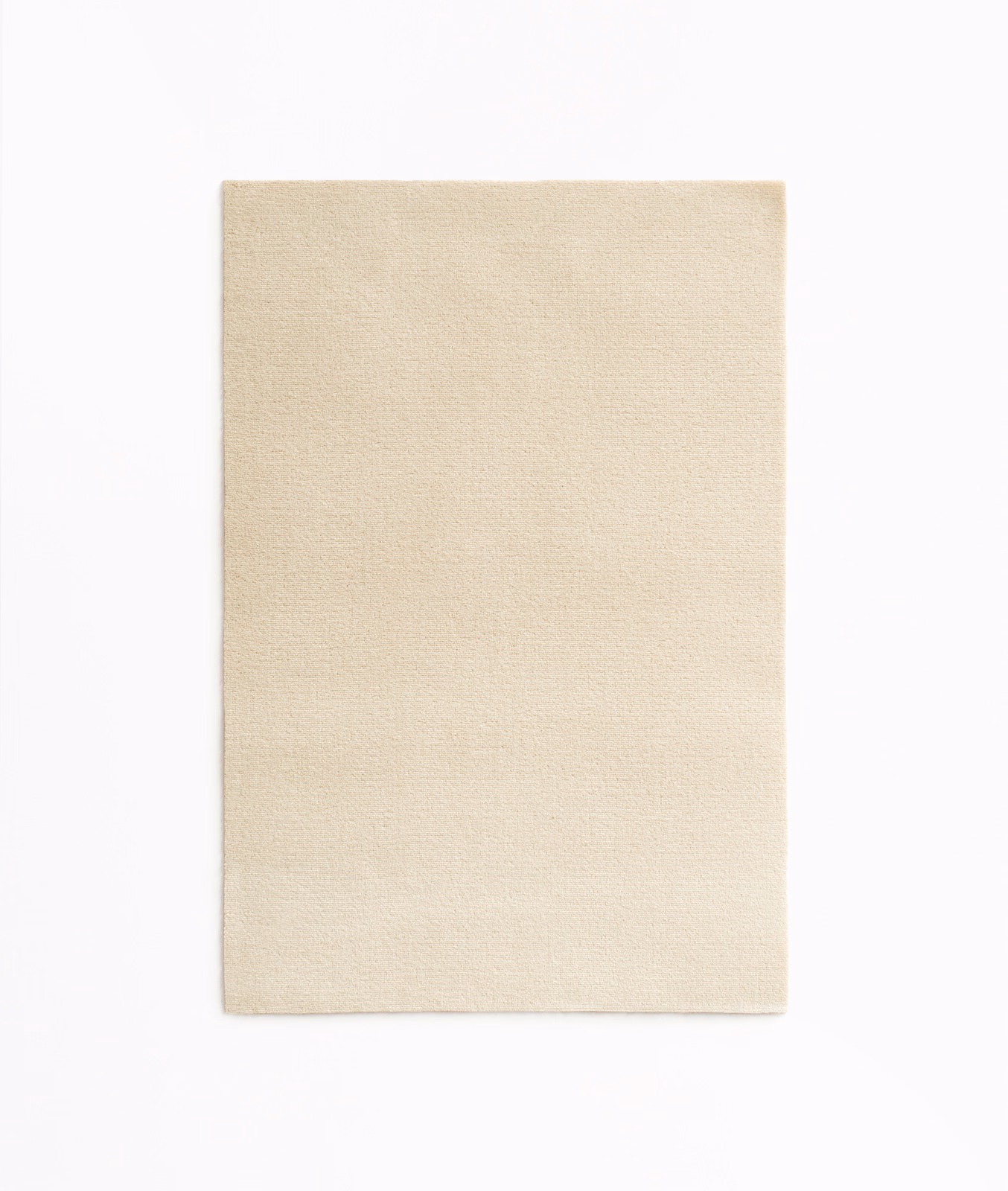 Warm ivory velvet swatch with a fine, softly light-catching nap