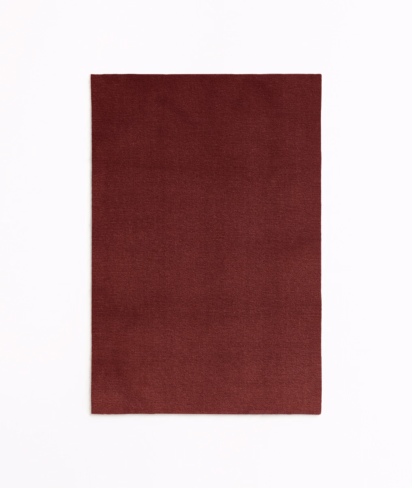 Deep Bordeaux burgundy velvet swatch with subtle directional pile and tonal shading