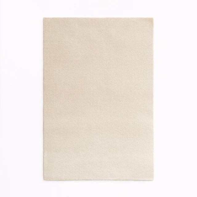 Pale champagne velvet swatch with a softly brushed, near-ivory surface