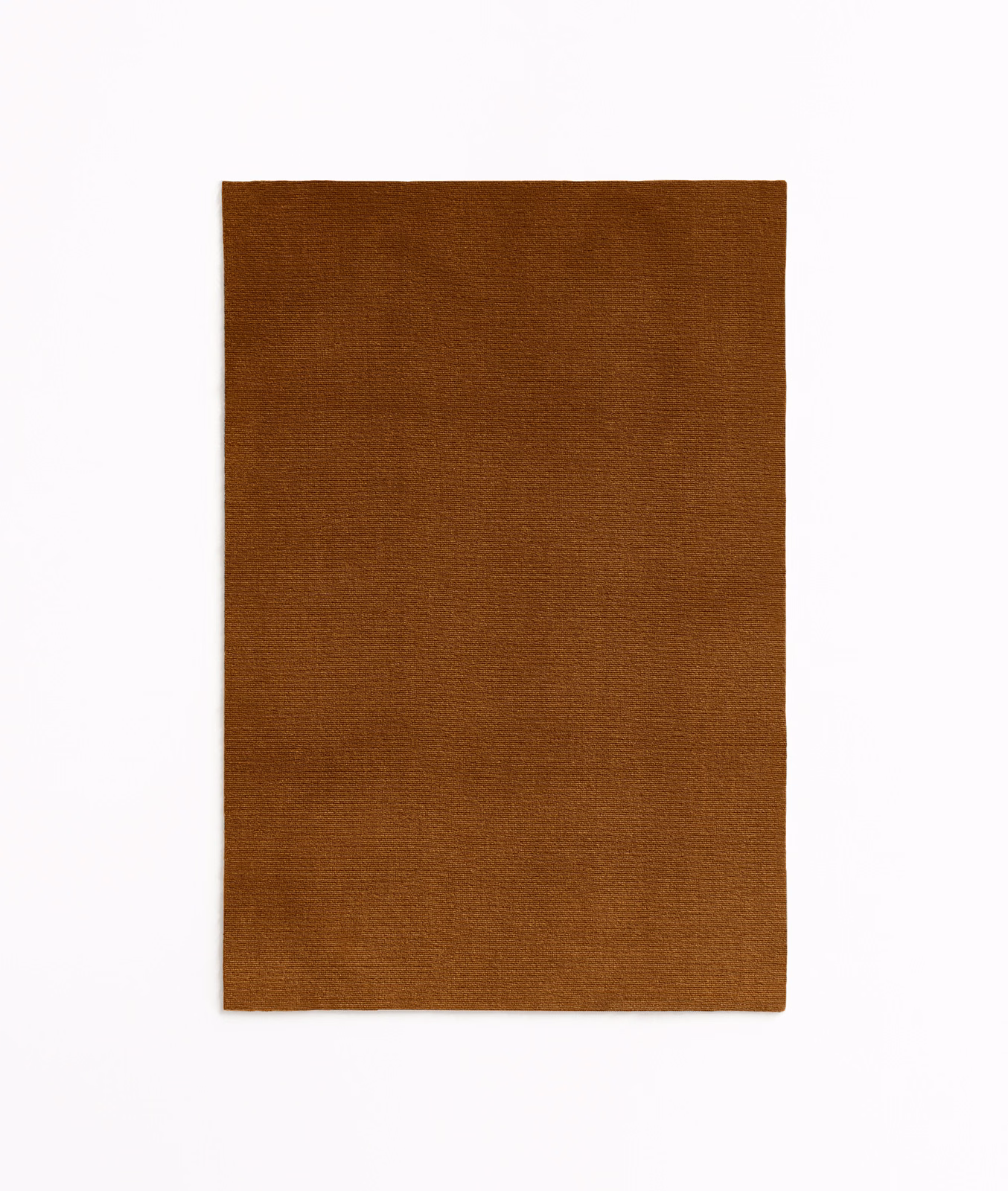 Warm tobacco-brown velvet swatch showing a softly shaded, plain nap